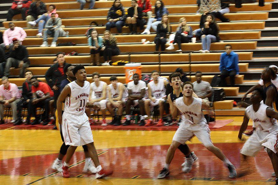 Reagan Colburn, and Ross Thompson box out for a rebound 