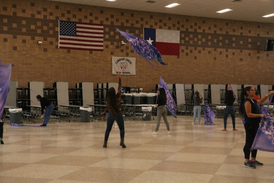 Color Guard Practicing for auditions for Winter Guard.