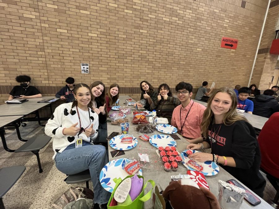 Students celebrate 
Valentines Day with a potluck. 
