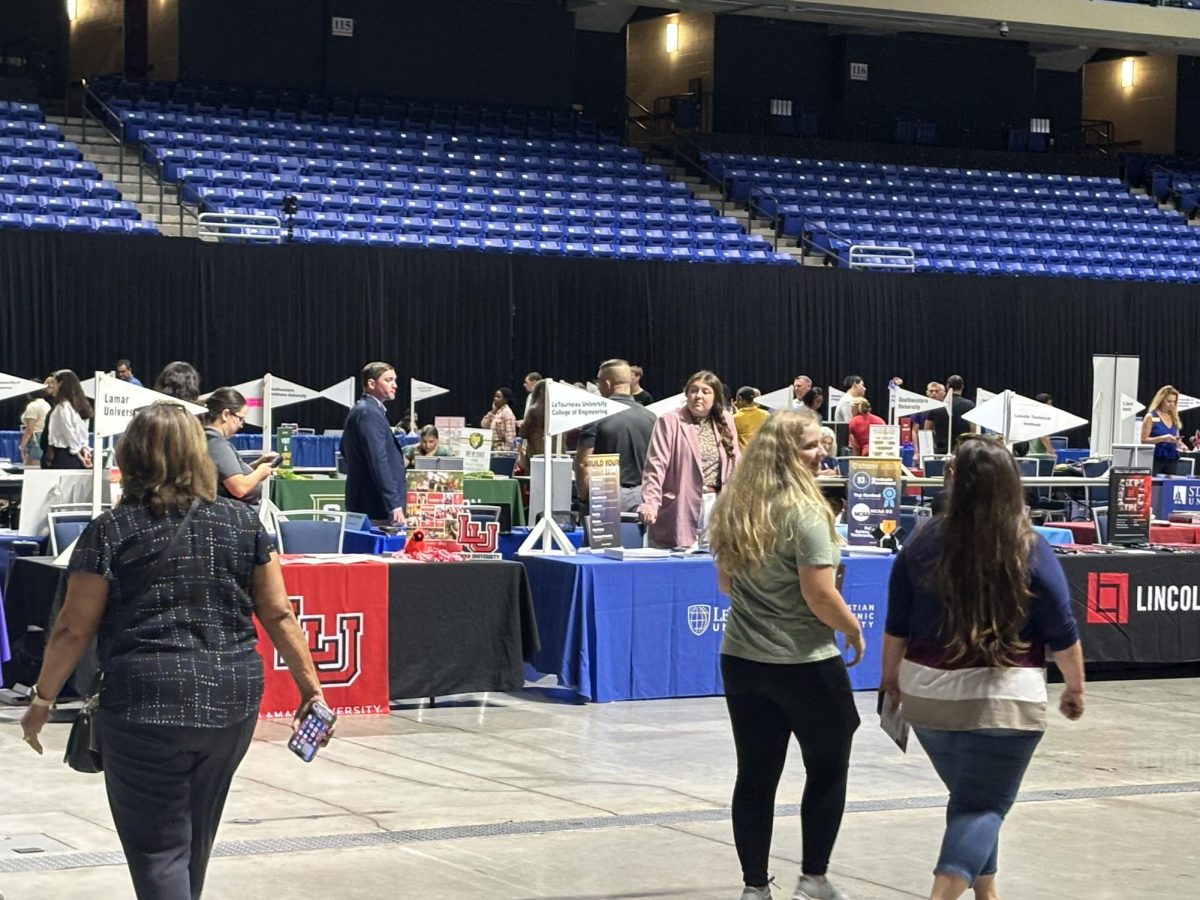 Students, parents, and community members mingle during the College Night event at the Berry Center on Oct. 1st. CFISD’s College night is a yearly event that gives high school students the opportunity to speak to representatives from various colleges across the country to grant further clarity in the college-seeking and application process.