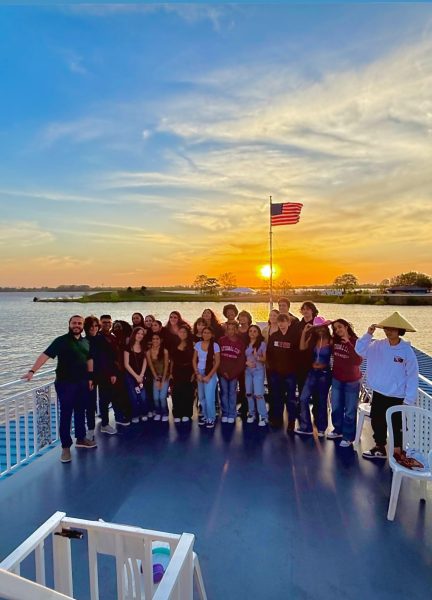 Langham Creek Choir watching a performance on a boat on the Mississippi River. 
