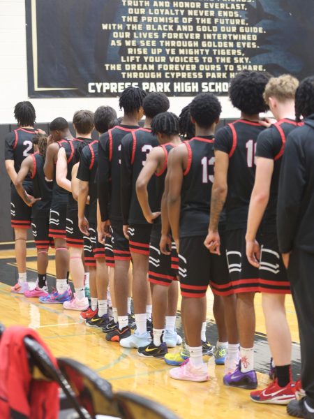 Varsity basketball boys lined up before the game. 